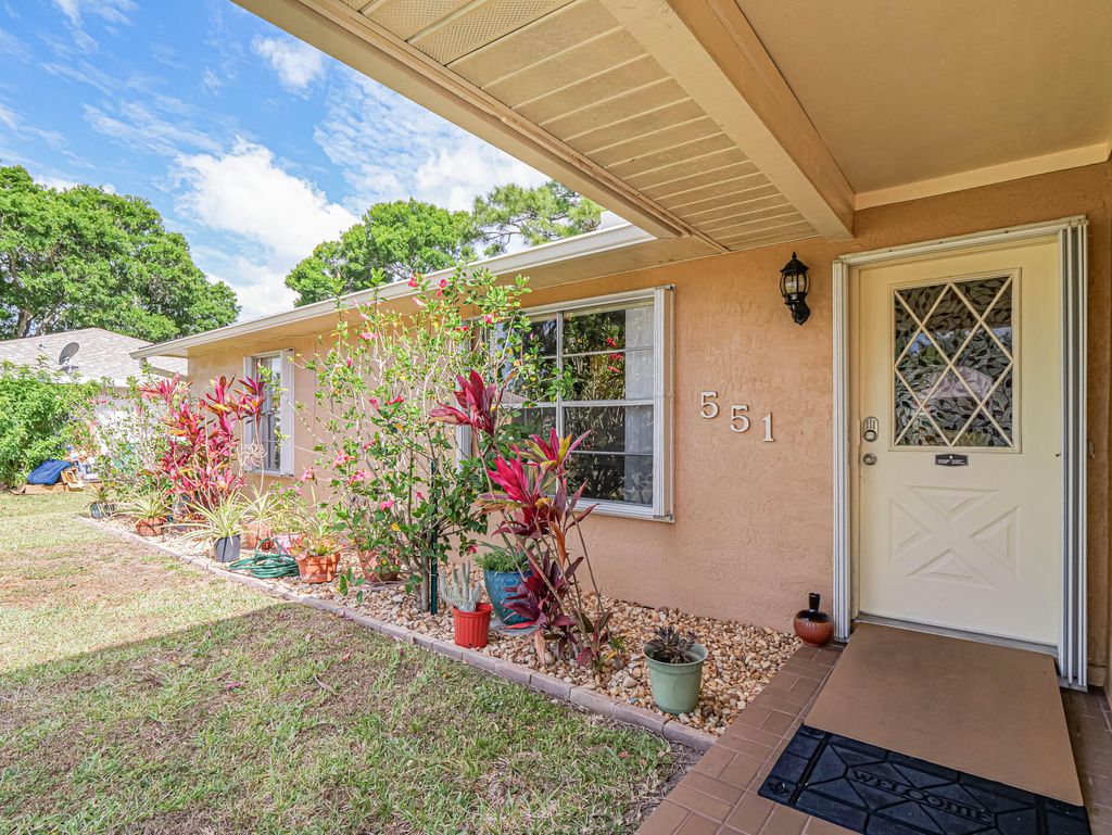 Photo of 551 SW Butler Avenue, Port Saint Lucie, FL 34983 (MLS # R10979587)