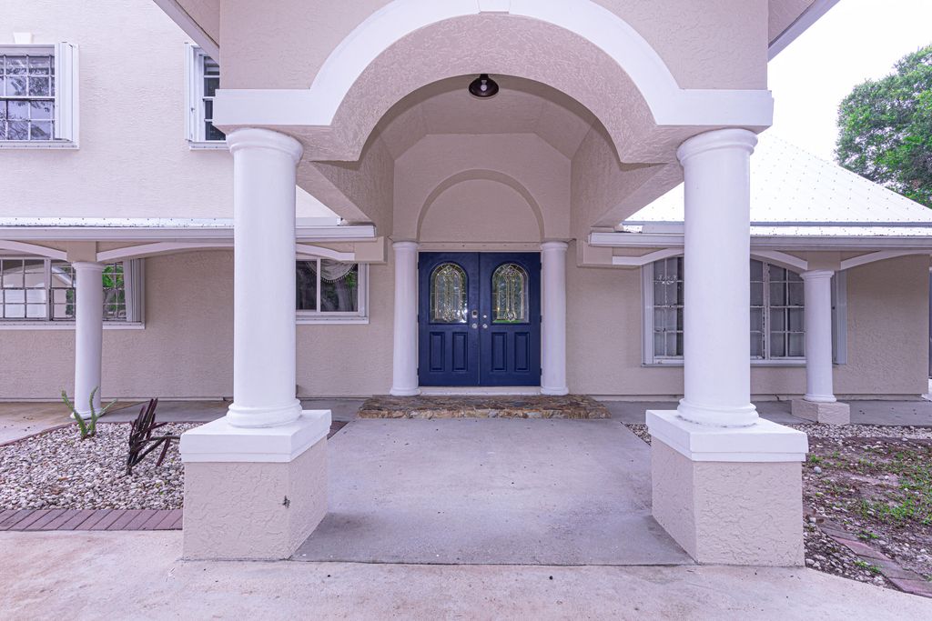 Photo of 17280 Hammock Lane, Port Saint Lucie, FL 34987 (MLS # B26001543)