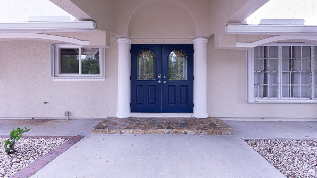 Photo of 17280 Hammock Lane, Port Saint Lucie, FL 34987 (MLS # B26001543)