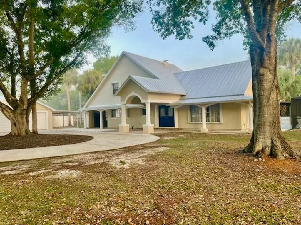 Photo of 17280 Hammock Lane, Port Saint Lucie, FL 34987 (MLS # B26001543)