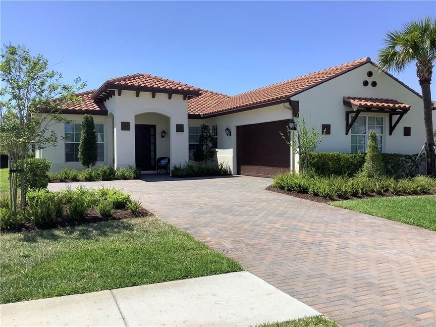 Stunning one-story single-family Pine Forest Spanish model featuring an extended driveway, barrel tile roof, open concept living & dining spaces, tray ceiling, large gourmet kitchen with 42" cabinets, walk-in pantry, center island, gas stove & dryer, Ring doorbell, tiles throughout, humongous walk-in closet. Remote control screened Lanai, recess lights, office with barn door, imparct windows. Large laundry area with lots of extra storage. Arden is an award-winning Community offering resort-style pools, gym, café, tennis, kiddy splash pool, 20 miles of walking trails, lakes, soccer field, & a five-acre working farm available for the residents to enjoy montlhy farm sharing. Nearby are grocery stores, banks & medical facilities, a wildlife preserve, an equestrian center & kayaking waterways.