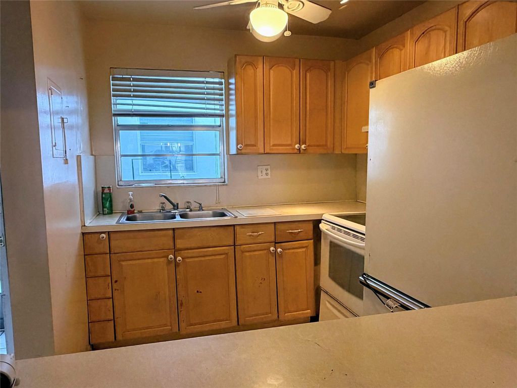 Photo of 6507 Winfield Boulevard #128-C, Margate, FL 33063 (MLS # F10552108)