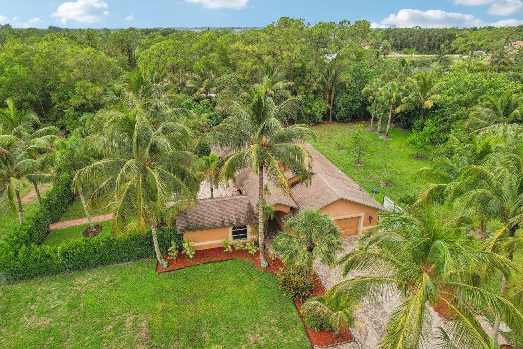 Photo of 18346 93rd Road N, The Acreage, FL 33470 (MLS # R10997043)