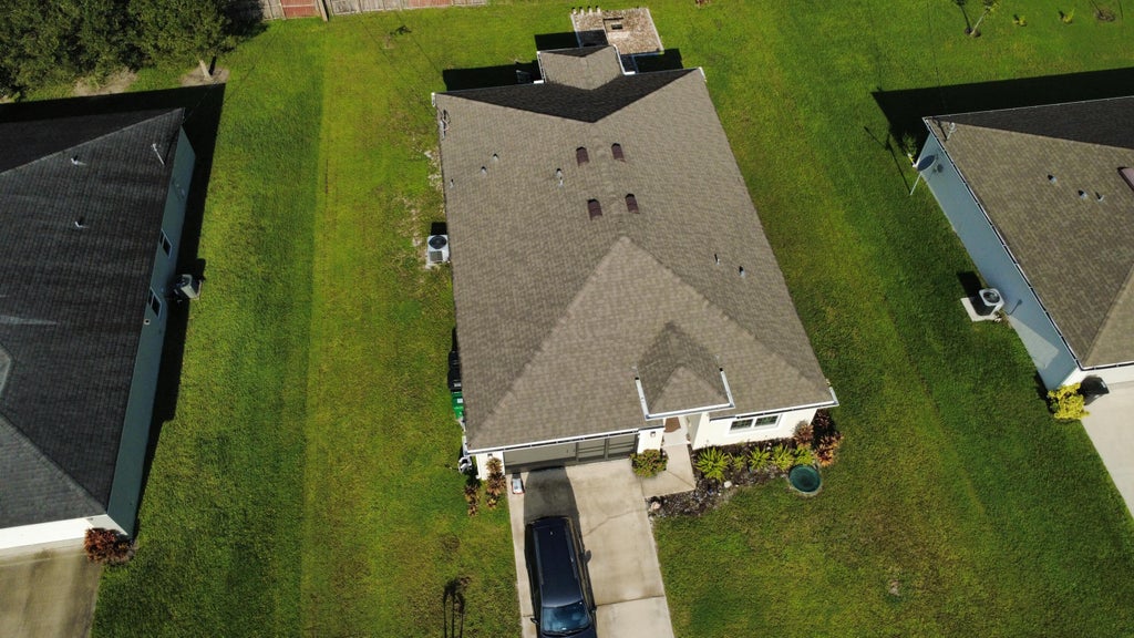 Photo of 1017 SW Longfellow Road, Port Saint Lucie, FL 34953 (MLS # B26071780)
