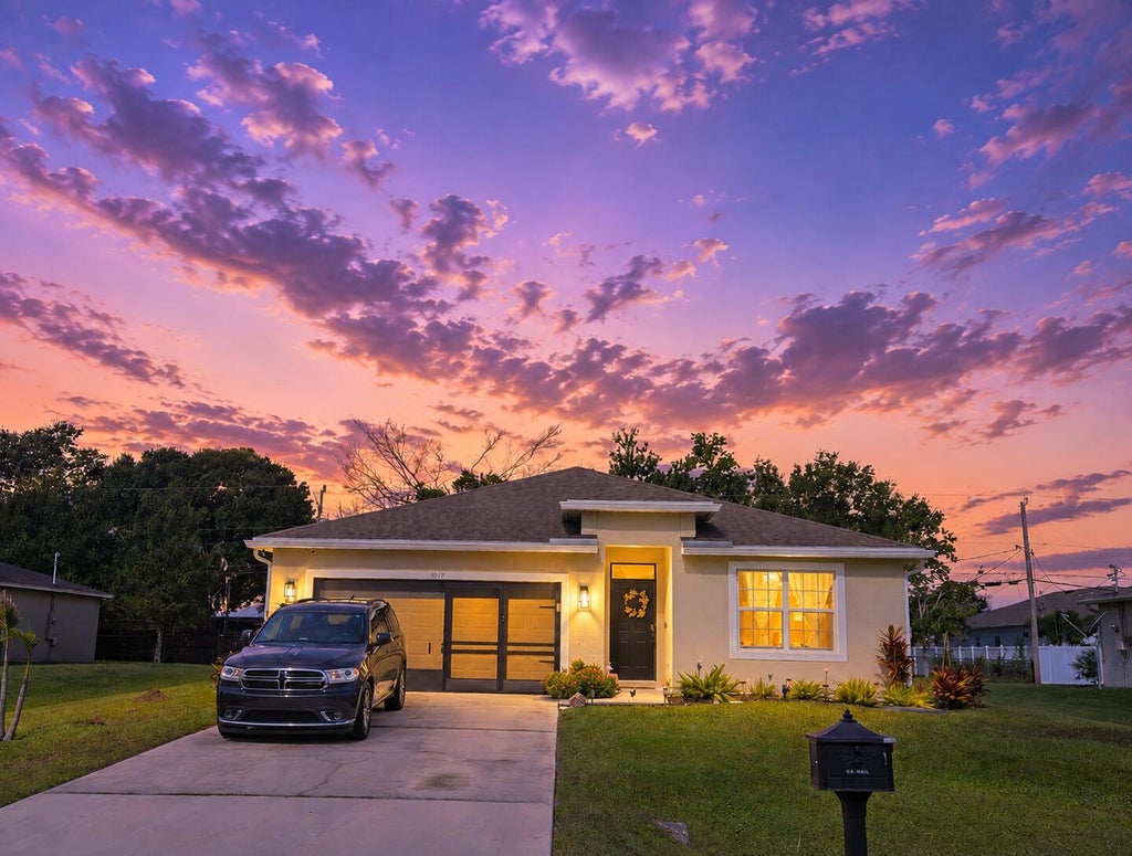 Photo of 1017 SW Longfellow Road, Port Saint Lucie, FL 34953 (MLS # B26071780)