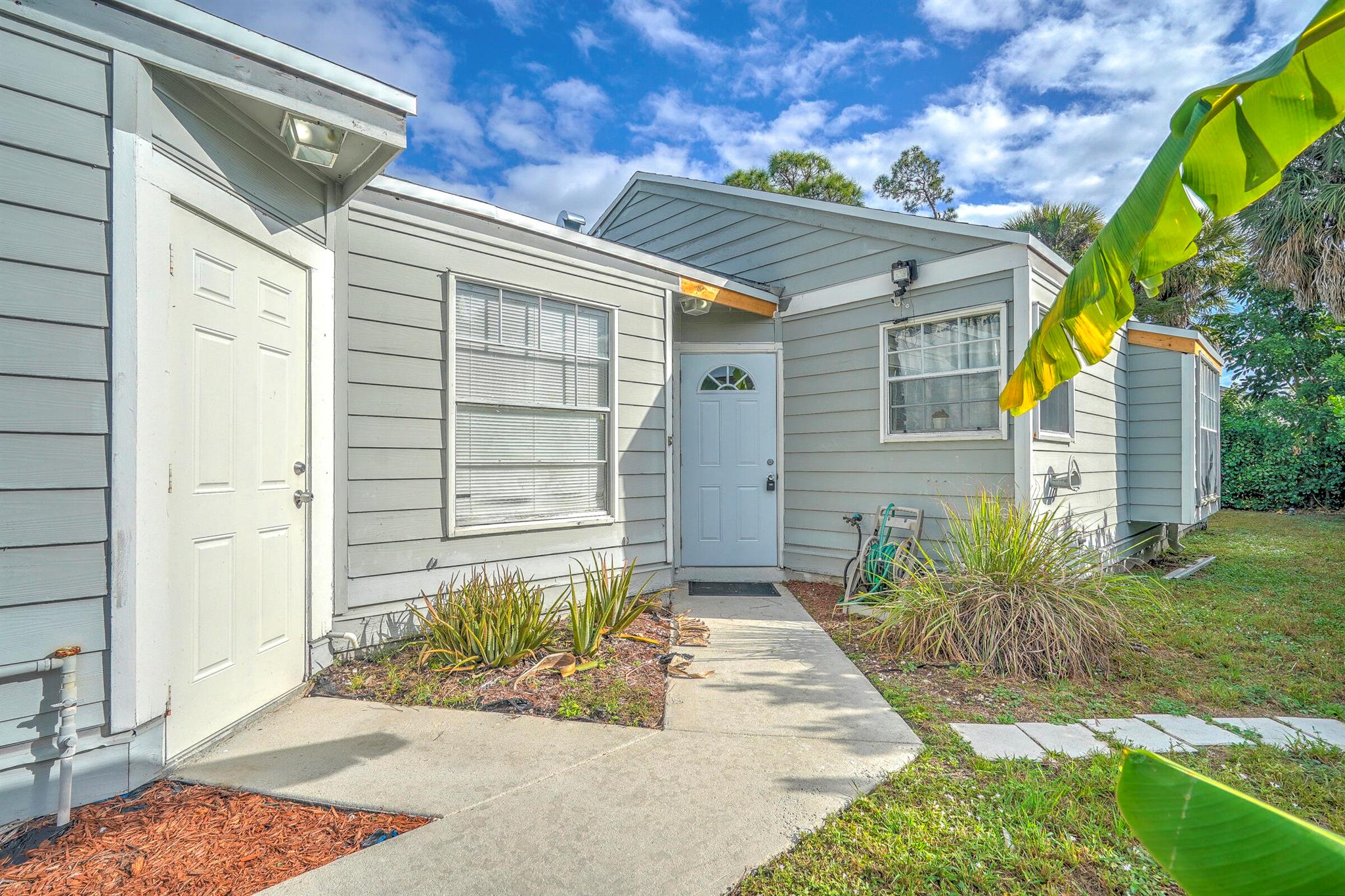 This spacious 2 bedroom 2 bath home is light and airy with modern touches. Enjoy the outdoors with a screened patio and full privacy in the rear. Includes a spacious backyard and 2-car garage. So many things to do in this gated community! Enjoy baseball, basketball, tennis/pickleball, swimming pool, and walking/biking trails! Ready for move in!