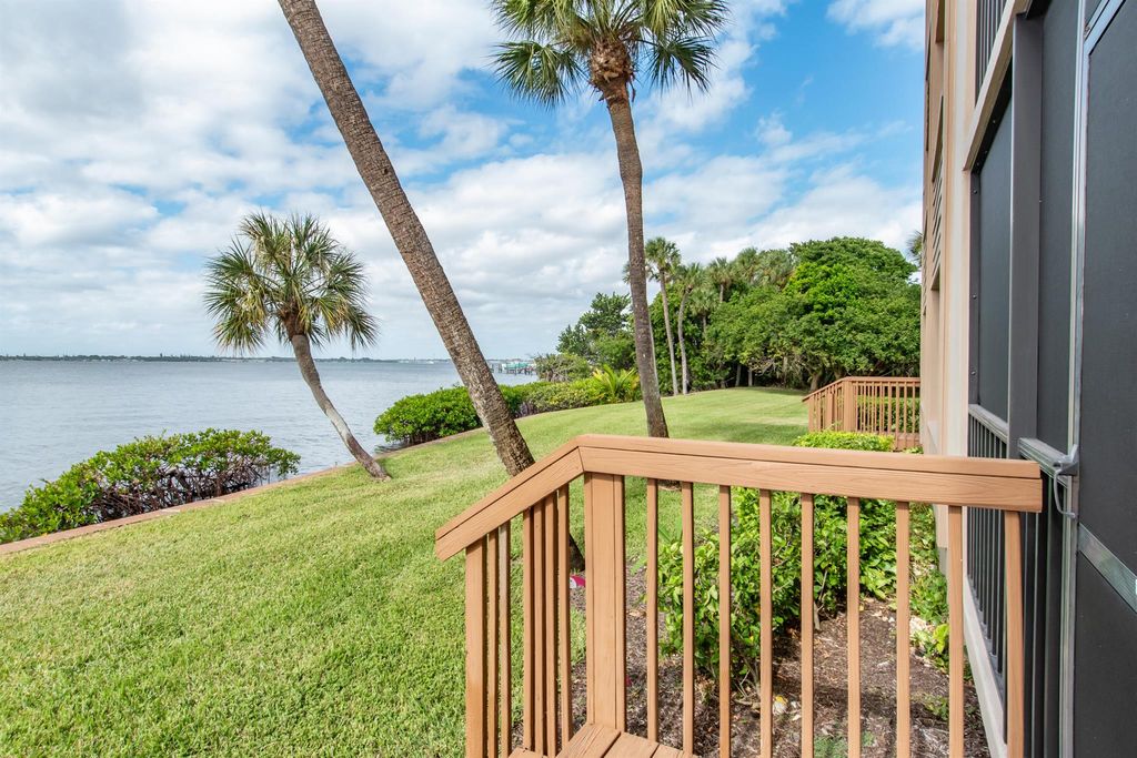 Photo of 4440 NE Sandpebble Trace #104, Stuart, FL 34996 (MLS # R11065573)