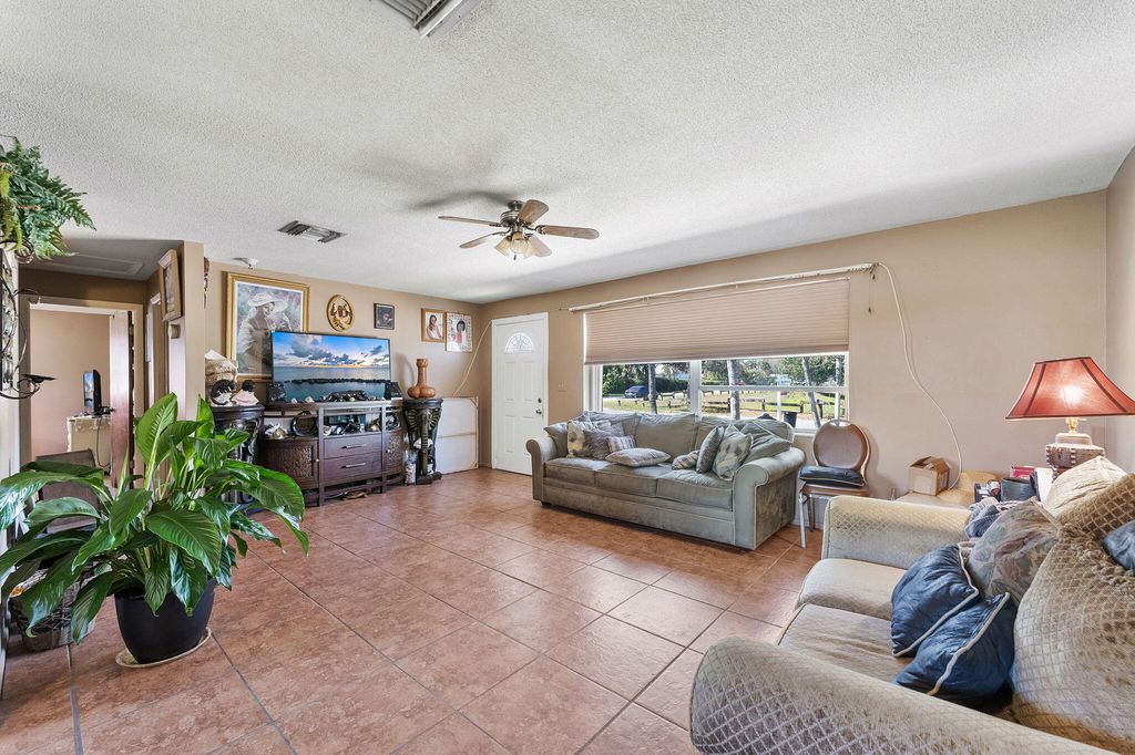 Photo of 3177 SE Golden Gate Avenue, Stuart, FL 34997 (MLS # B26011895)