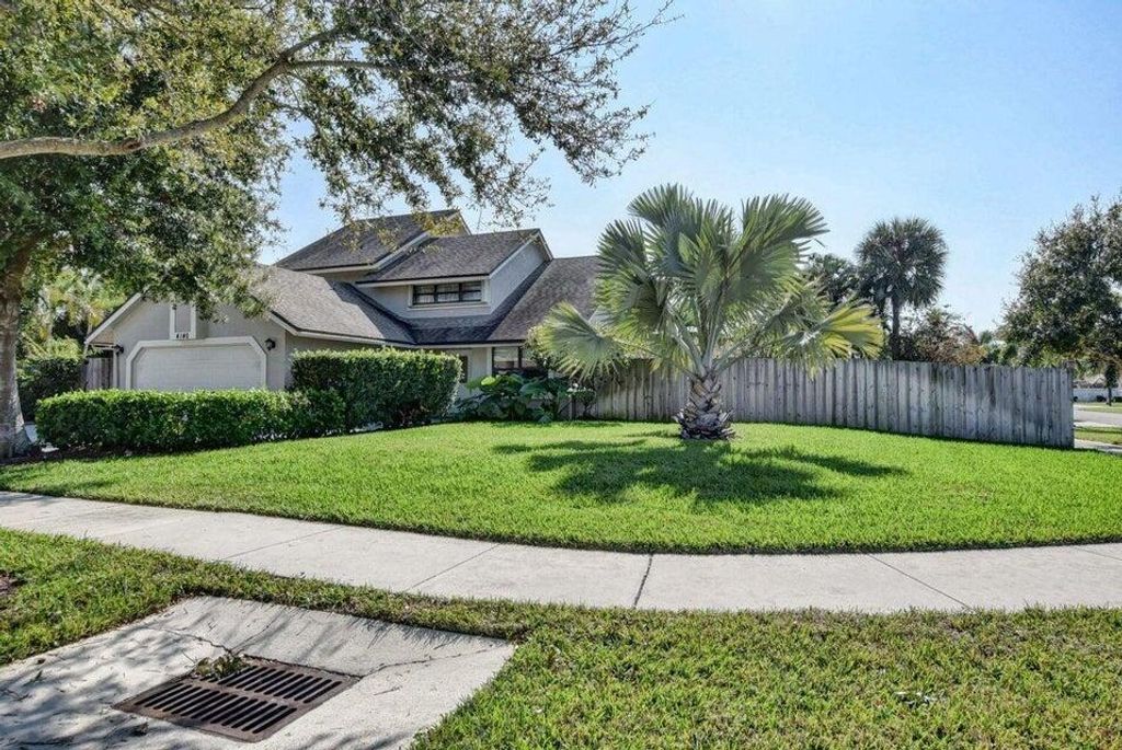 Photo of 4140 Woods End Road, Boca Raton, FL 33487 (MLS # B26032944)