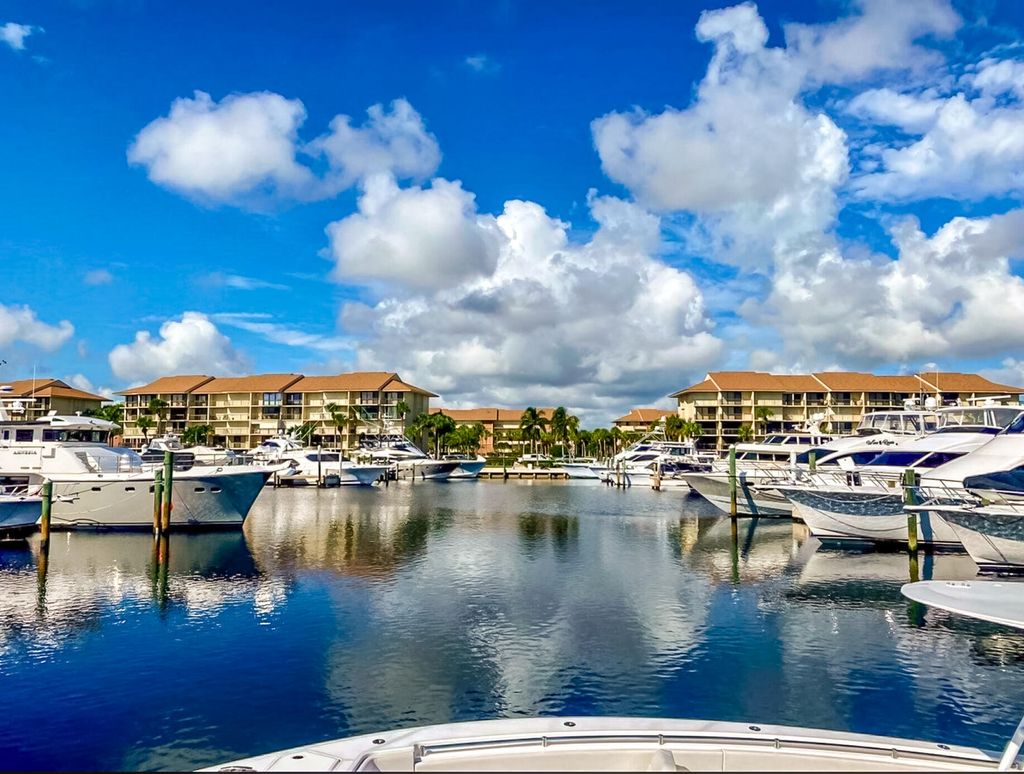 Photo of 1701 Marina Isle Way #103, Jupiter, FL 33477 (MLS # B26023538)