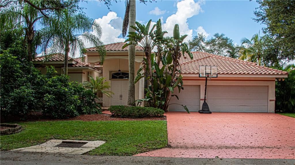 Photo of 6111 NW 60th Ave, Parkland, FL 33067 (MLS # F10302457)