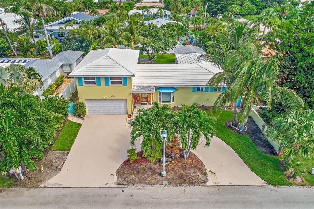 Photo of 207 Blossom Lane Ln, Palm Beach Shores, FL 33404 (MLS # R10716972)