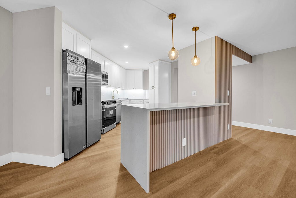 Photo of 5701 CAMINO DEL SOL #102, Boca Raton, FL 33433 (MLS # B26078939)