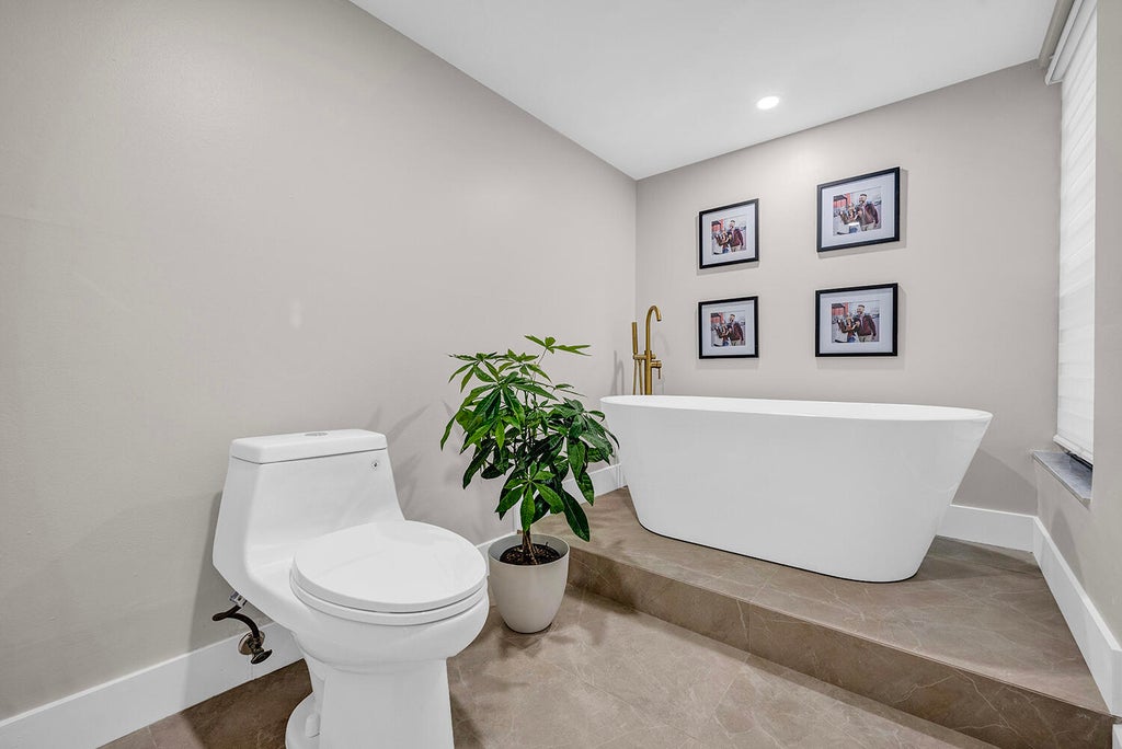 Photo of 5701 CAMINO DEL SOL #102, Boca Raton, FL 33433 (MLS # B26078939)