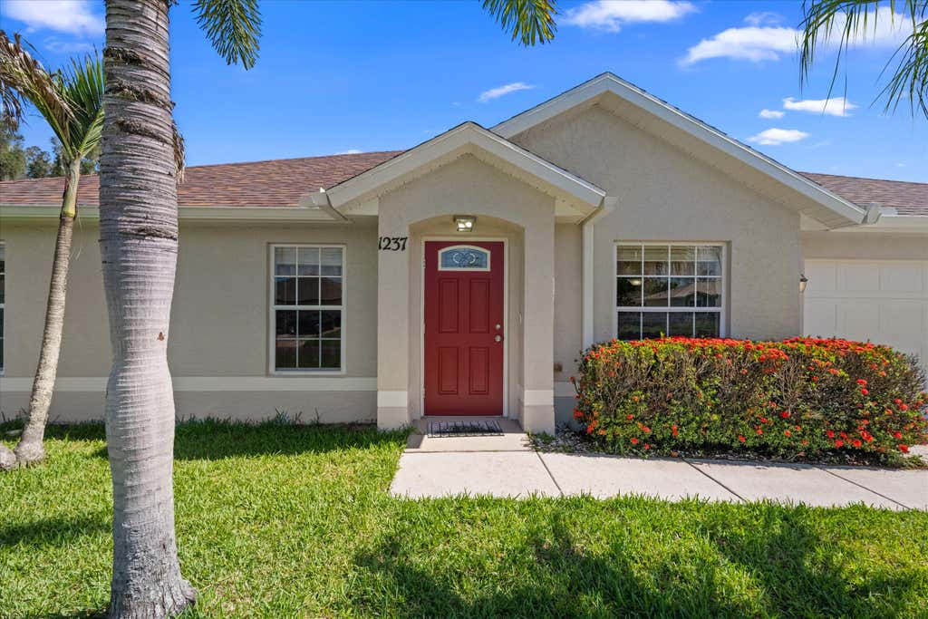 Photo of 1237 SW Granville Avenue, Port Saint Lucie, FL 34953 (MLS # B26052671)