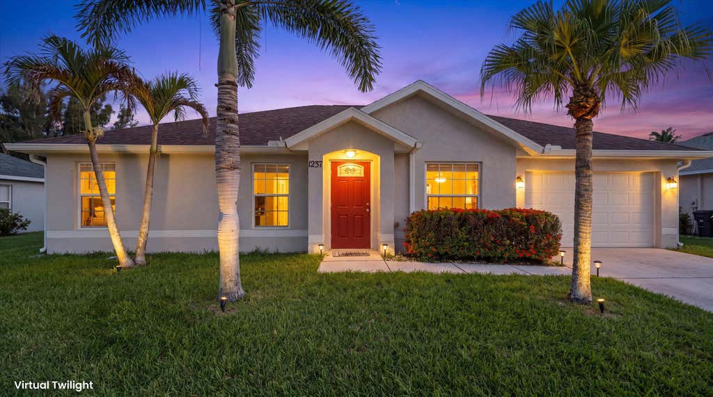 Photo of 1237 SW Granville Avenue, Port Saint Lucie, FL 34953 (MLS # B26052671)