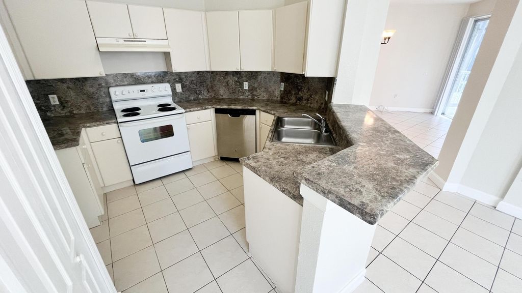 Photo of 2010 Shoma Drive, West Palm Beach, FL 33414 (MLS # B26006561)