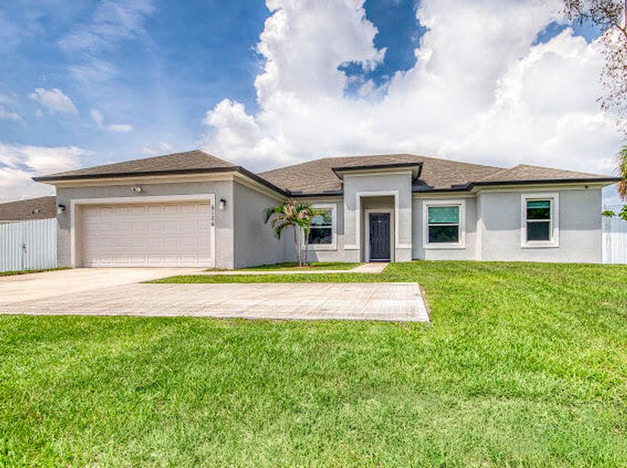 Practically perfect POOL home just in time for summer! Rare 4/BR/3BA plus Den pool home in the heart of Port St. Lucie featuring over 2,300 living sq ft, impact windows and doors, open-concept living, and a fully fenced backyard designed for Florida living. Built in 2022, this move-in ready CBS home offers a spacious chef's kitchen with stainless steel appliances, large island, and abundant natural light throughout. The oversized primary suite features dual vanities, Roman tub, separate shower, and walk-in closets. No HOA, plenty of room for a boat or RV, and conveniently located near shopping, dining, I-95, and top schools. Summer starts here!