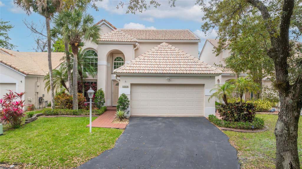 Photo of 3668 Wilderness Way, Coral Springs, FL 33065 (MLS # B26064250)