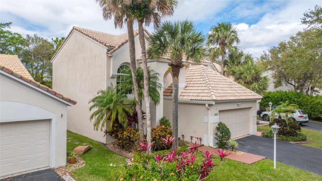 Photo of 3668 Wilderness Way, Coral Springs, FL 33065 (MLS # B26064250)