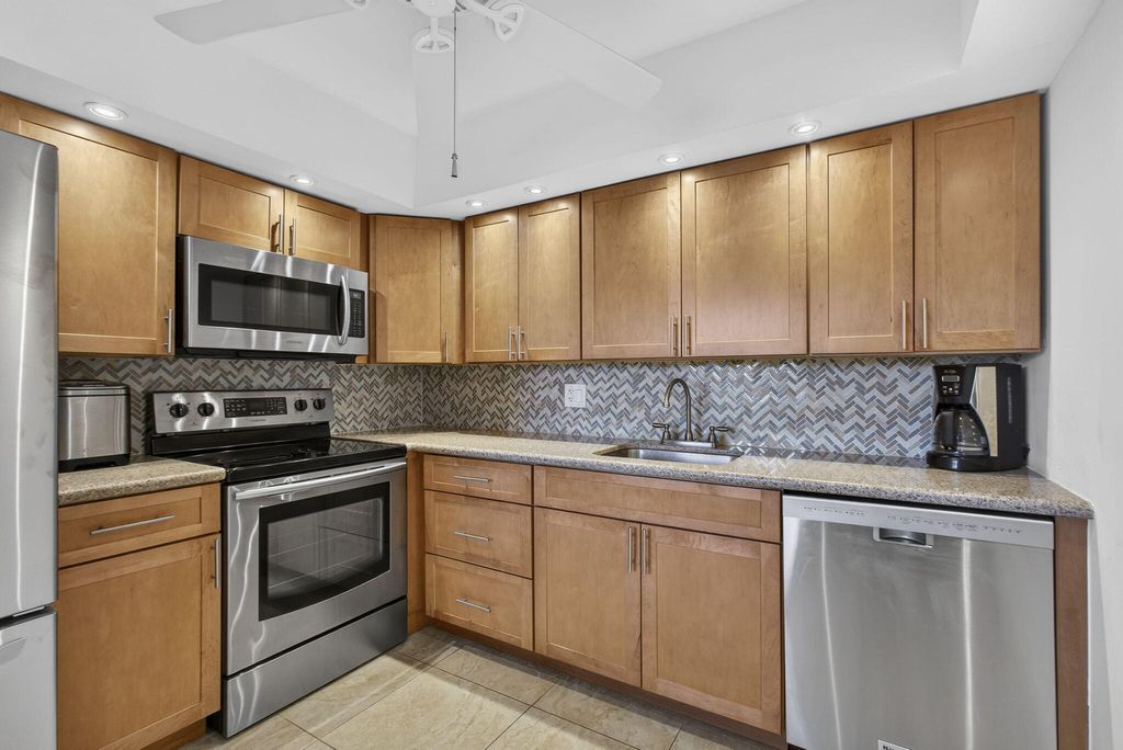 Photo of 361 Wellington J, West Palm Beach, FL 33417 (MLS # B26004035)