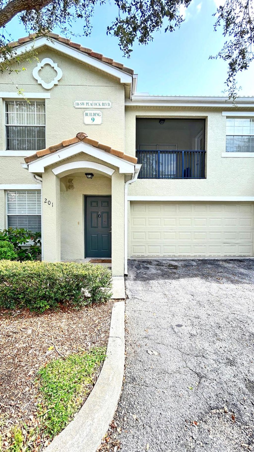 Photo of 116 SW Peacock Boulevard #9-201, Port Saint Lucie, FL 34986 (MLS # R11138310)