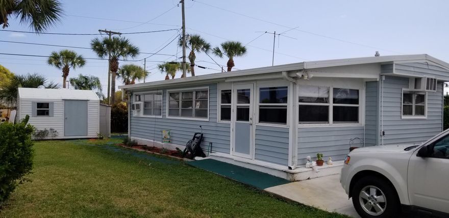 INCREDIBLE OPPORTUNITY TO OWN THE BEST LOCATION IN THE ENTIRE COMMUNITY. LOCATED RIGHT NEXT TO THE CLUBHOUSE AND POOL, THIS METICULOUSLY MAINTAINED HOME HAS IT ALL. THE ROOF HAS JUST BEEN RESEALED, EVERYTHING IS IN GREAT WORKING ORDER, AND THE INSIDE IS BRIGHT, WIDE OPEN AND SPACIOUS. IT COMES PARTIALLY FURNISHED WITH THE OUTDOOR SHED STAYING AS WELL. THE INTERIOR IS IMMACULATE AND READY FOR YOU TO MOVE RIGHT IN WITH NOTHING NEEDING TO BE DONE, BUT TO SIT BACK AND RELAX. CONVENIENTLY LOOKED JUST OFF OF ATLANTIC AVENUE THIS HIDDEN JEM OF A COMMUNITY IS SO DESIRABLE IT IS OFTEN HARD TO FIND ANYTHING AVAILABLE IN HERE, LET ALONE ONE THAT IS THIS GOOD!  PLEASE DO NOT HESITATE AS WE EXPECT THIS PROPERTY TO GO QUICK.