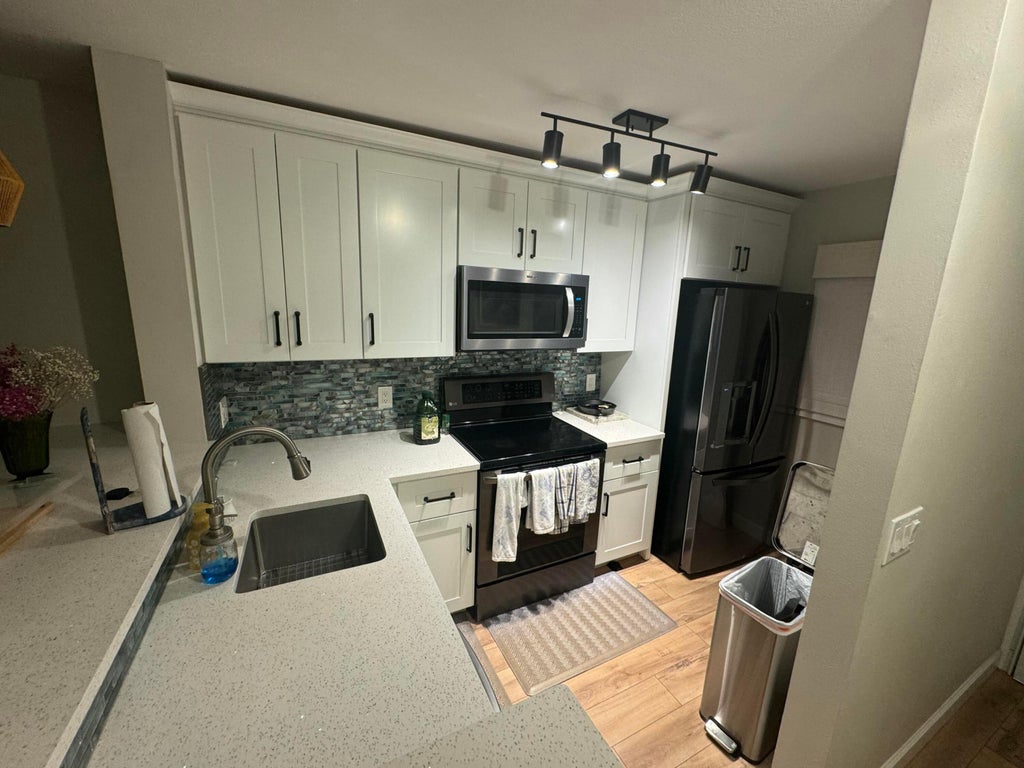 Photo of 9427 S OCEAN Drive #56, Jensen Beach, FL 34957 (MLS # B26056000)