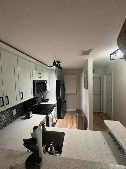 Photo of 9427 S OCEAN Drive #56, Jensen Beach, FL 34957 (MLS # B26056000)