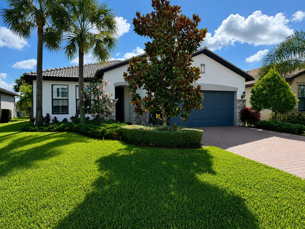 Photo of 348 SE COURANCES Drive, Port Saint Lucie, FL 34984 (MLS # B26066780)