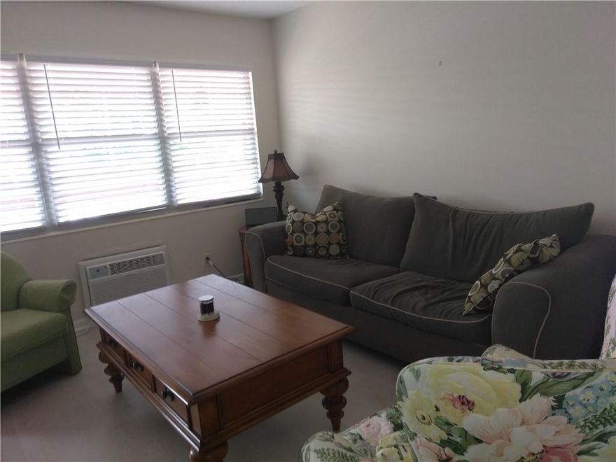 Lovely, Renovated 1 Bedroom & 1 Bathroom, 2nd Floor in 2-Story Building!! Association Claims 55+ Adult Community. New Kitchen & White Cabinets, Stainless Steel Refrigerator, Stove and Microwave; New Water Heater, New Air Conditioner, Light Wood Laminate Floors; New Bathroom with White Vanity, Shower/Tub Combo; Large Closets; Great Seating Area In Screened Florida Room Over-Looking Nice Garden-View; Parking Close to Short Walk-Way! 3-mile Walking Path Around the Complex; Large Clubhouse with Indoor/Outdoor Pools, Huge State-of-the-Art Fitness Area; Many Clubs to Join! Billiards, Free Movies, Live Entertainment in Large Auditorium with a Seating of 1600! Tennis Courts & Outdoor Pools throughout the Complex; Bocce Ball, Shuffle Boards.Cohen's Cafe' with Outdoor Seating!  A must see!! Monthly Assessments Is $272,50,$36.00 East Coast Mgmt.$109.50 Bay Management$127.00 Master Management There is an Annual Fee for Insurance/Assessment of $1067.  Can be paid quarterly...