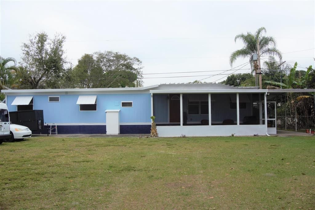 Photo of 1216 SW Tropical Terrace, Stuart, FL 34997 (MLS # R10771907)