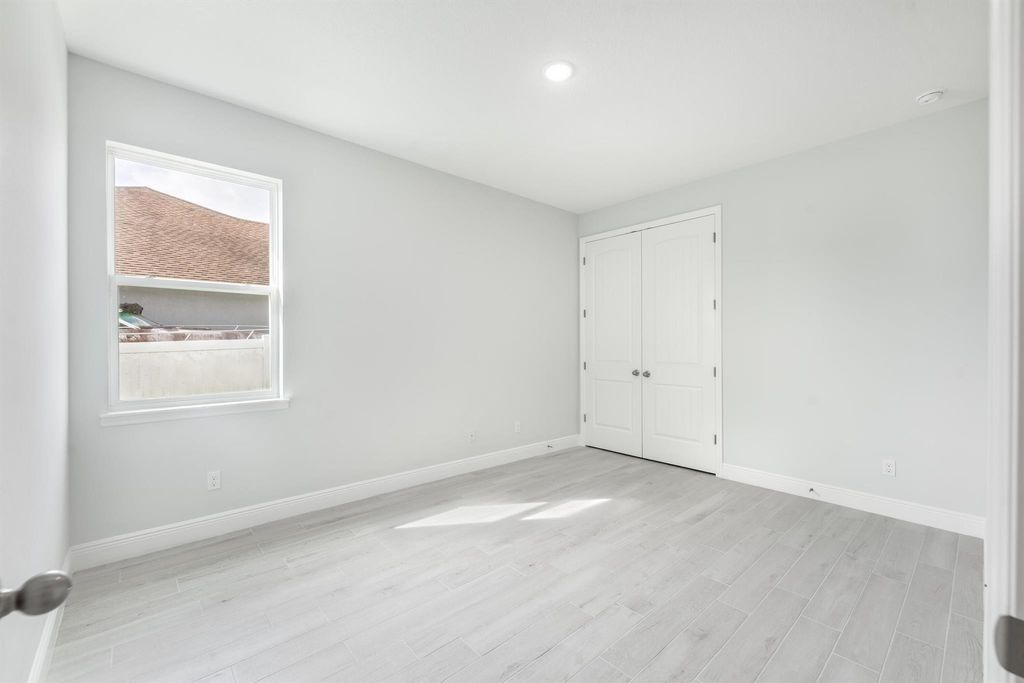 Photo of 1825 SW Millikin Avenue, Port Saint Lucie, FL 34953 (MLS # R11065035)