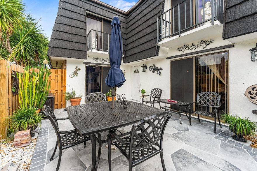 Welcome to this beautifully maintained and spacious 3BR/2.5BA townhome!
Enjoy peace of mind with a new Aluminum roof, new AC, newer appliances, and a cozy gas fireplace. The inviting kitchen features stainless steel appliances and warm finishes that make cooking a delight.
Upstairs, you'll find a primary suite and guest bedroom—each with its own private balcony—perfect for morning coffee or evening relaxation. All bathrooms include double sinks, with a convenient first-floor half bath and laundry room for added ease.
Truly move-in ready, this home also offers a private patio and courtyard ideal for entertaining or quiet evenings outdoors. Ideally situated for both comfort and convenience, Perfectly positioned near schools, Palm Beach State College, the airport, and local hospital.