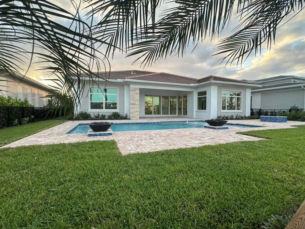 Photo of 9125 Coral Isles Circle #{Lot 82}, Palm Beach Gardens, FL 33412 (MLS # R11086705)