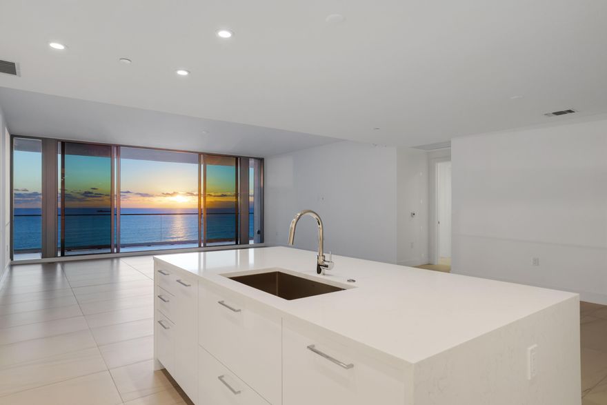Now is your opportunity to own the epitome of luxury at Fort Lauderdale Beach's newest completed development Selene Oceanfront Residences. Perfectly situated, this direct oceanfront facing Azure features unobstructed water views while simultaneously elevated enough to see and hear waves breaking on shore from throughout the unit. An oversized great room is anchored by the chef's kitchen with custom modern white front and black interior cabinetry, quartz slab backsplash and Wolf and Subzero appliance package. Stepping outside is the ultimate outdoor entertaining space with 50 feet of oceanfront balcony. Two large bedrooms and a closed off den, each with their own ensuite bath, provide versatile living spaces. 5 Star Amenities include two pools, fitness center, media theater and concierge.