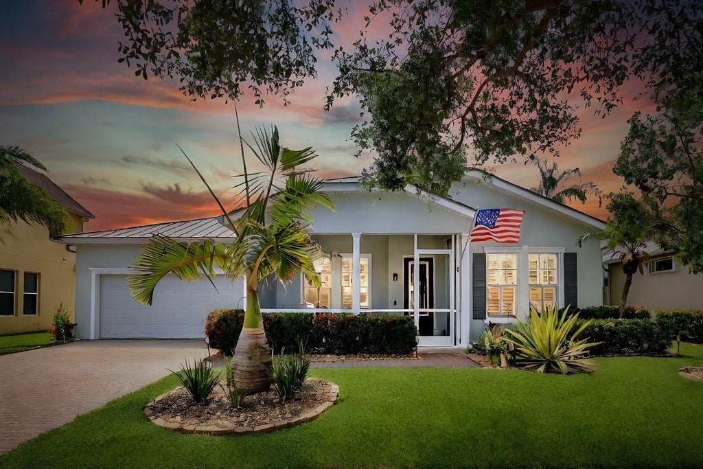 Photo of 10557 SW Waterway Lane, Port Saint Lucie, FL 34987 (MLS # F10440783)