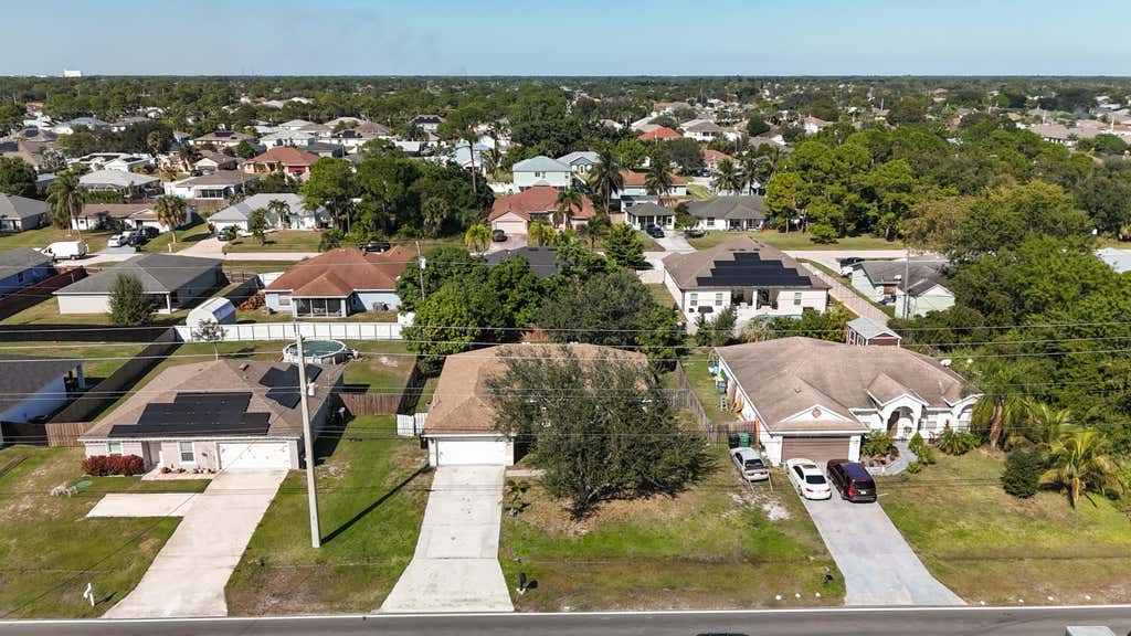 Photo of 1037 SW Paar Drive, Port Saint Lucie, FL 34953 (MLS # R11142821)