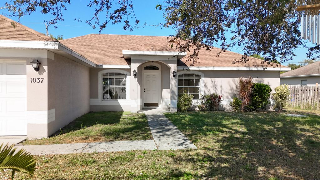 Photo of 1037 SW Paar Drive, Port Saint Lucie, FL 34953 (MLS # R11142821)