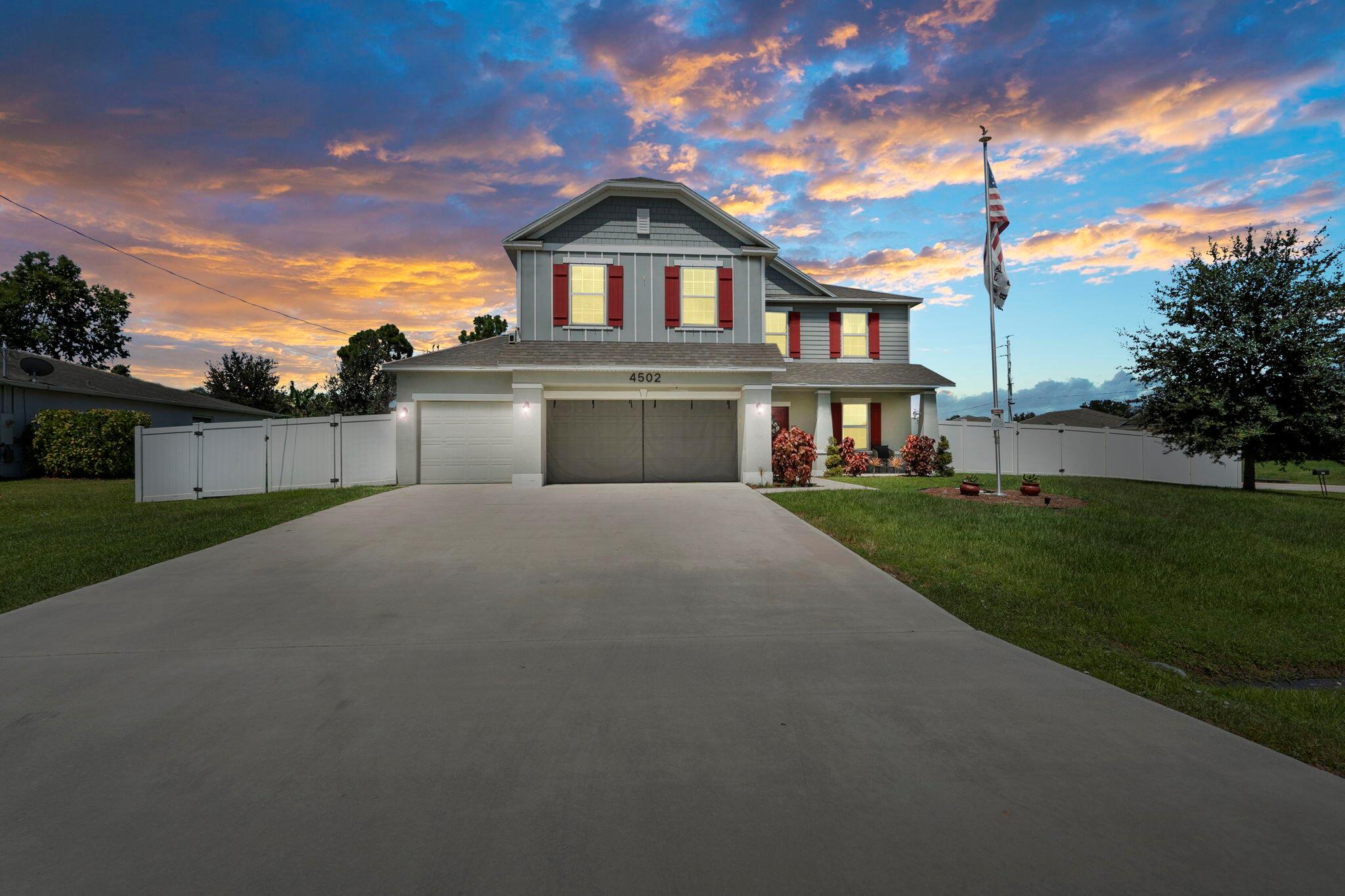 2019 CBS 5-Bedroom Home with 3-Car Garage on Oversized Lot - No HOA! Look no further - this 2019-built CBS home offers 5 spacious bedrooms and 3 full bathrooms, including a first-floor bedroom with en suite bath and walk-in closet. The kitchen features quartz countertops, a large island, and plenty of storage. This home boasts luxury vinyl plank flooring and tile throughout along with $60,000 in builder upgrades. Enjoy formal dining, a versatile upstairs loft, and the convenience of a 3-car garage. Situated on an oversized 1/3-acre lot that is fully fenced and backing to Woodlands Trail Park, you'll have direct access to walking trails, a dog park, BBQ grills, a fitness station, and a playground - all with no HOA restrictions. Bring your boat or RV! Ideally situated just minutes from I-95