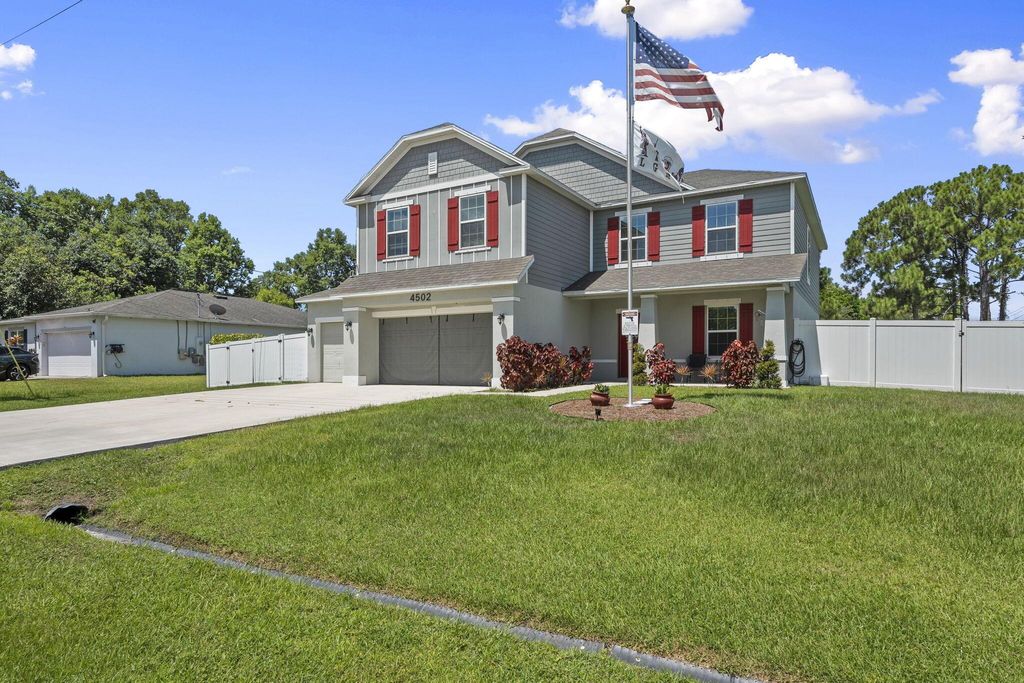 Photo of 4502 SW Hallmark Street, Port Saint Lucie, FL 34953 (MLS # R11114240)