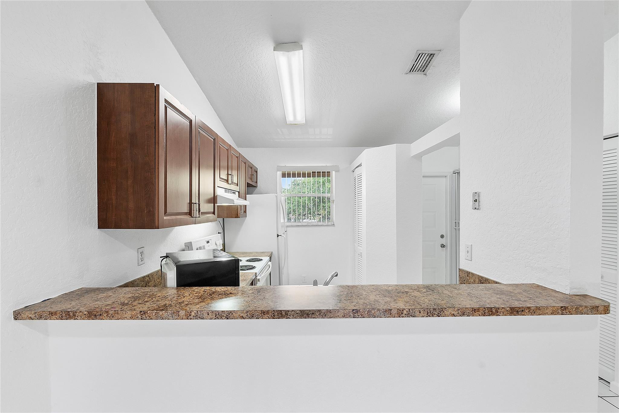 GARDENS OF SUNRISE CONDO - Residential Lease