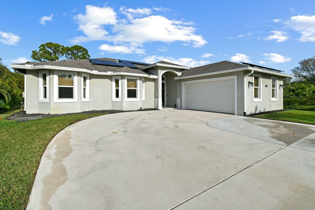 Photo of 3214 SW Constellation Road, Port Saint Lucie, FL 34953 (MLS # R11054399)