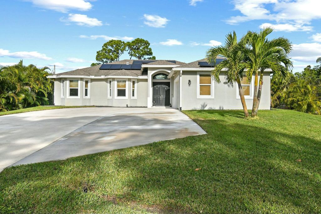 Photo of 3214 SW Constellation Road, Port Saint Lucie, FL 34953 (MLS # R11054399)