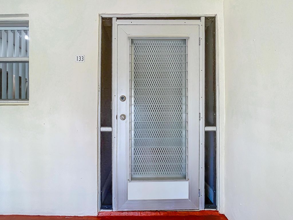 Photo of 133 Lake Evelyn Drive, West Palm Beach, FL 33411 (MLS # B26003076)