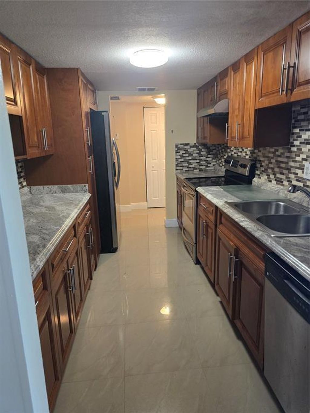 Photo of 7051 Environ Boulevard, Lauderhill, FL 33319 (MLS # B26001606)