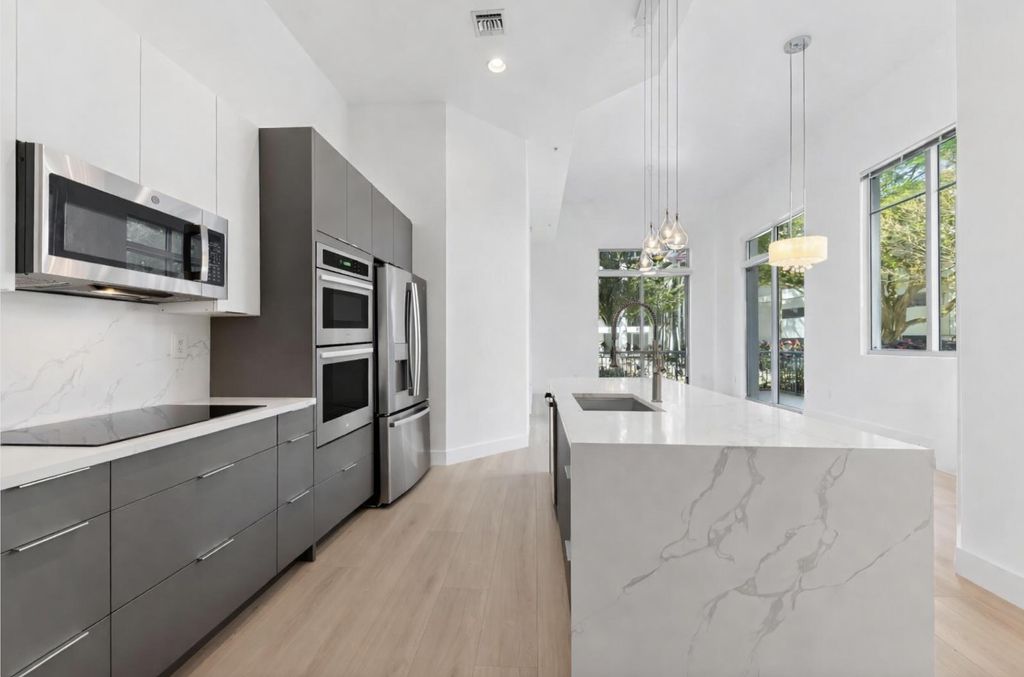 Photo of 300 S Australian Avenue #105, West Palm Beach, FL 33401 (MLS # B26001338)