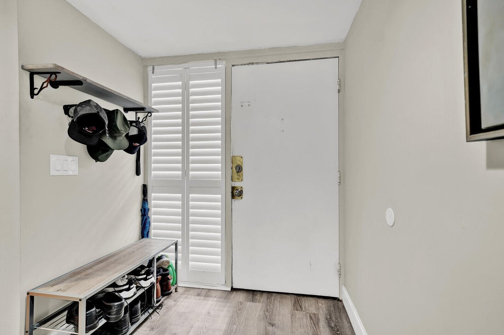 Photo of 25 Deer Creek Road #C101, Deerfield Beach, FL 33442 (MLS # B26044671)