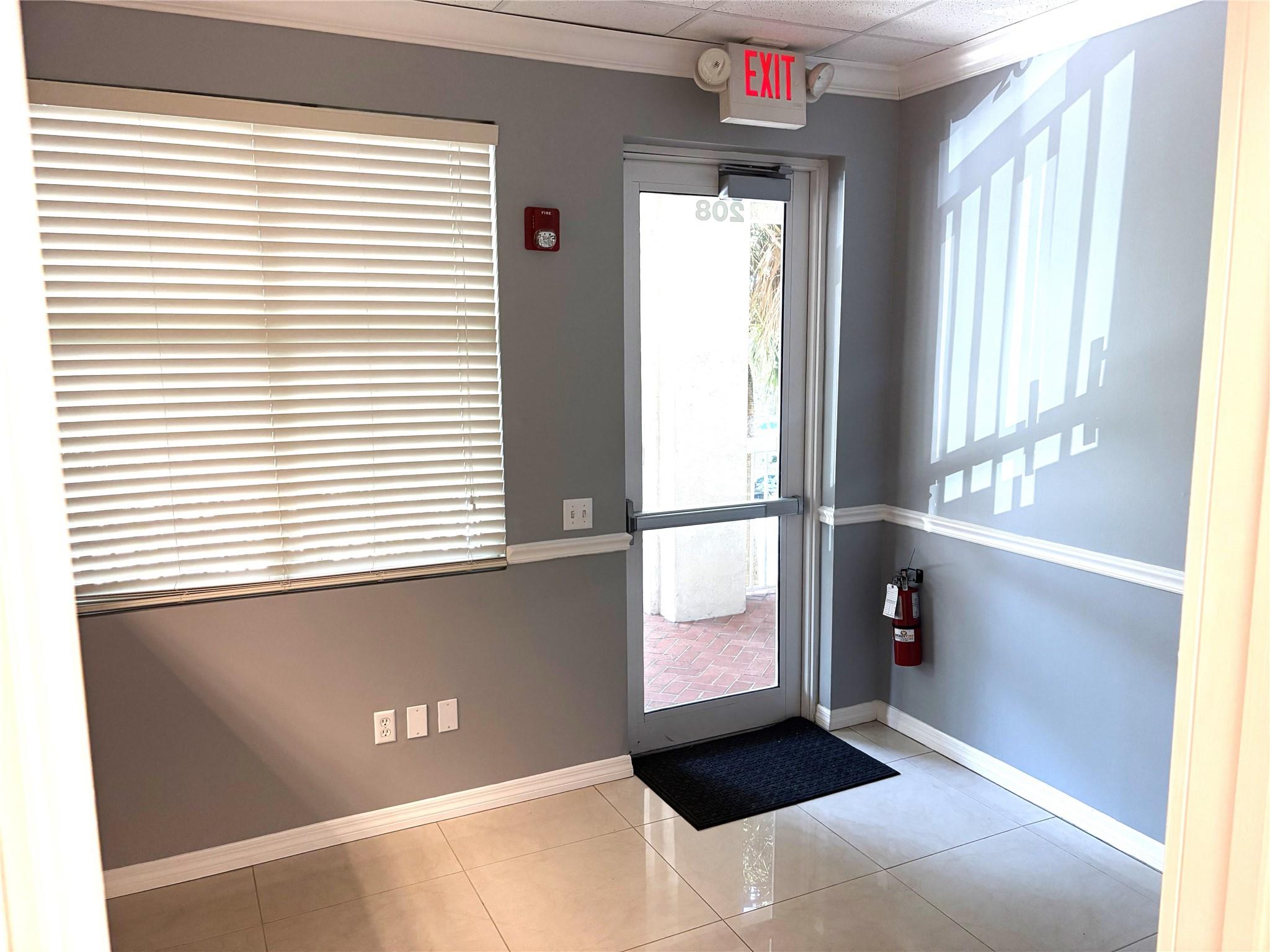 Spacious professional office suite features 693 sq. ft. is move-in ready and includes furniture as shown. The well-designed layout features four private offices, a welcoming reception area, a kitchenette, a private restroom, and storage area, perfect for legal, financial, or professional services, conveniently located at the corner of Broward Blvd and Pine Island Rd.