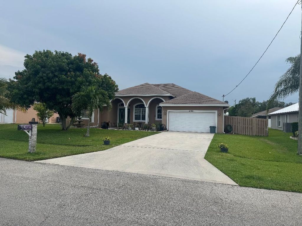 Photo of 5760 NW Cleburn Drive, Port Saint Lucie, FL 34986 (MLS # R11093742)